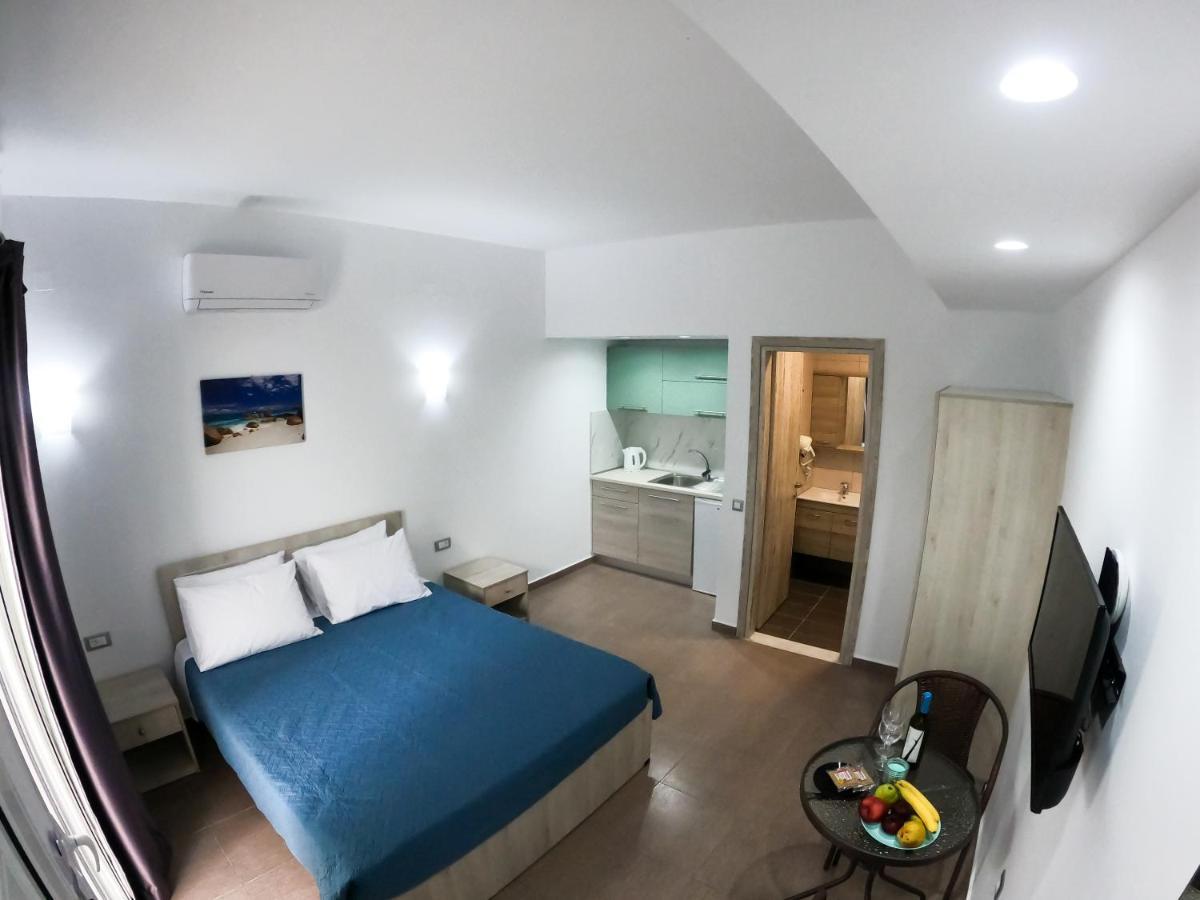 Red Hibiscus Stegna Guest House Archangelos  Exterior photo