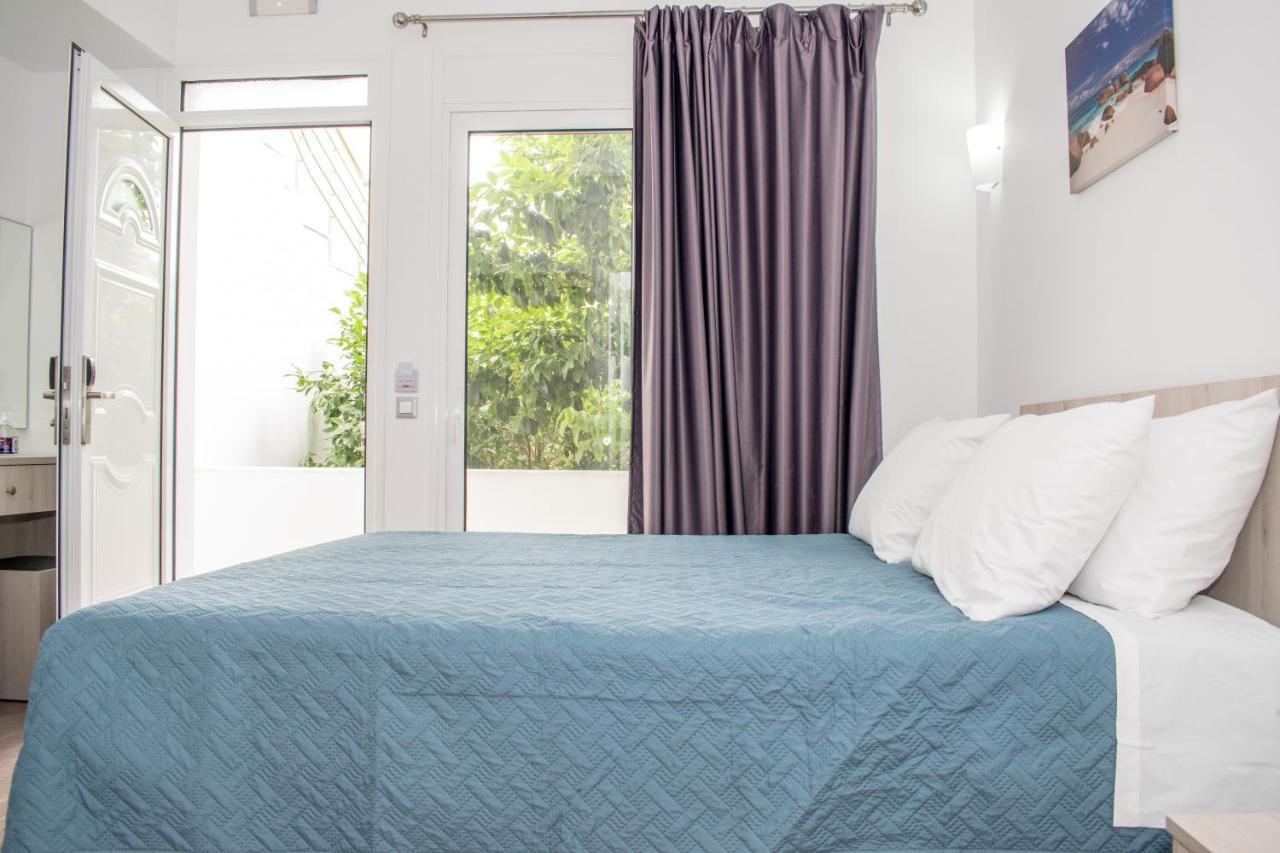 Red Hibiscus Stegna Guest House Archangelos  Exterior photo