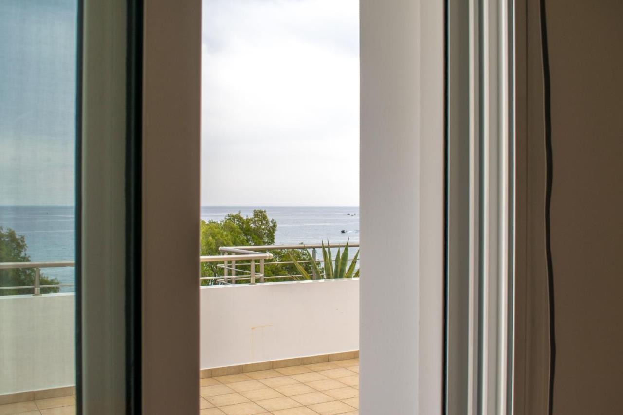 Red Hibiscus Stegna Guest House Archangelos  Exterior photo