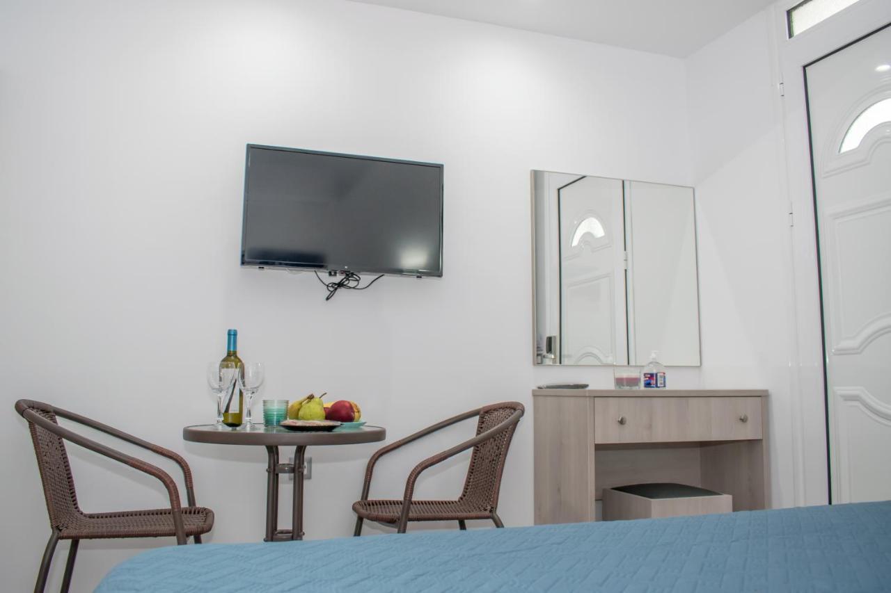 Red Hibiscus Stegna Guest House Archangelos  Exterior photo